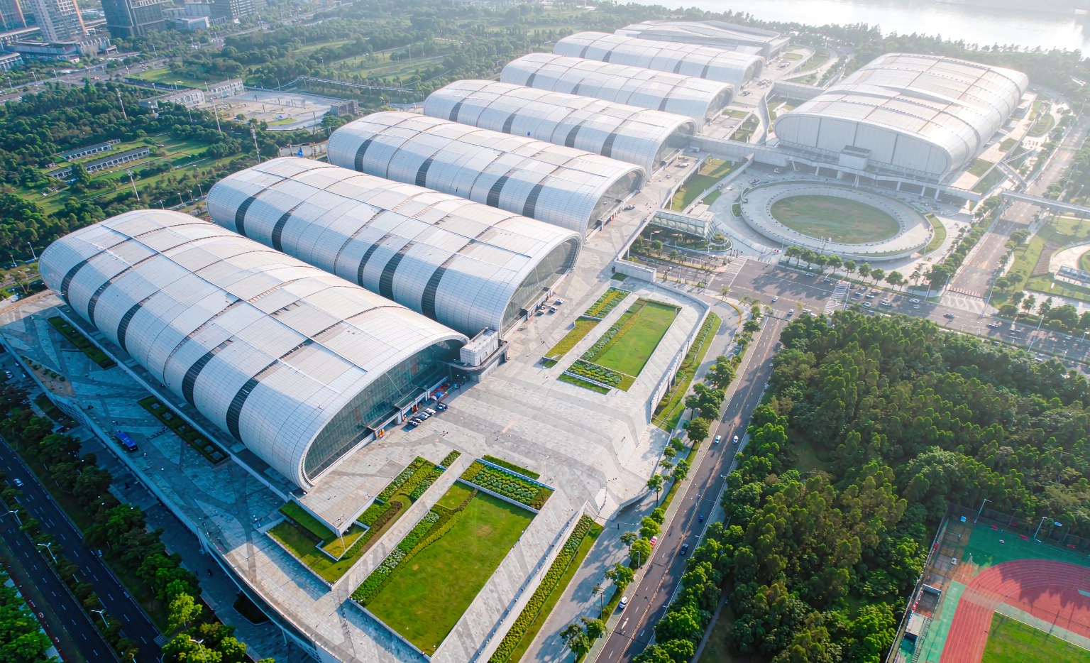 Pazhou complex aerial view showing the auto parts halls at Canton Fair 2026, where brakes, filters, suspension and electrical buyers source from China