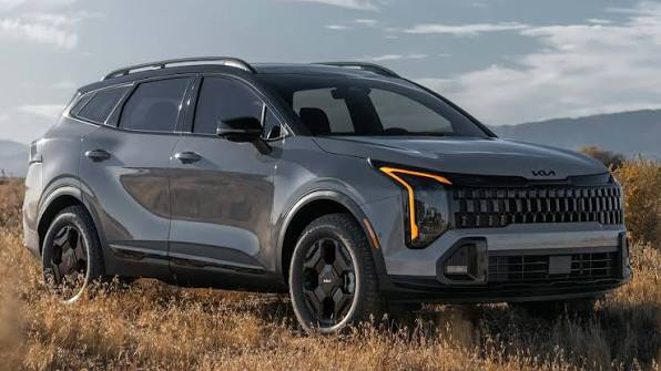 2026 Kia Sportage gray front view in wilderness terrain — all-terrain capability with 181mm ground clearance, compact SUV export from China FOB Nansha Globalucar