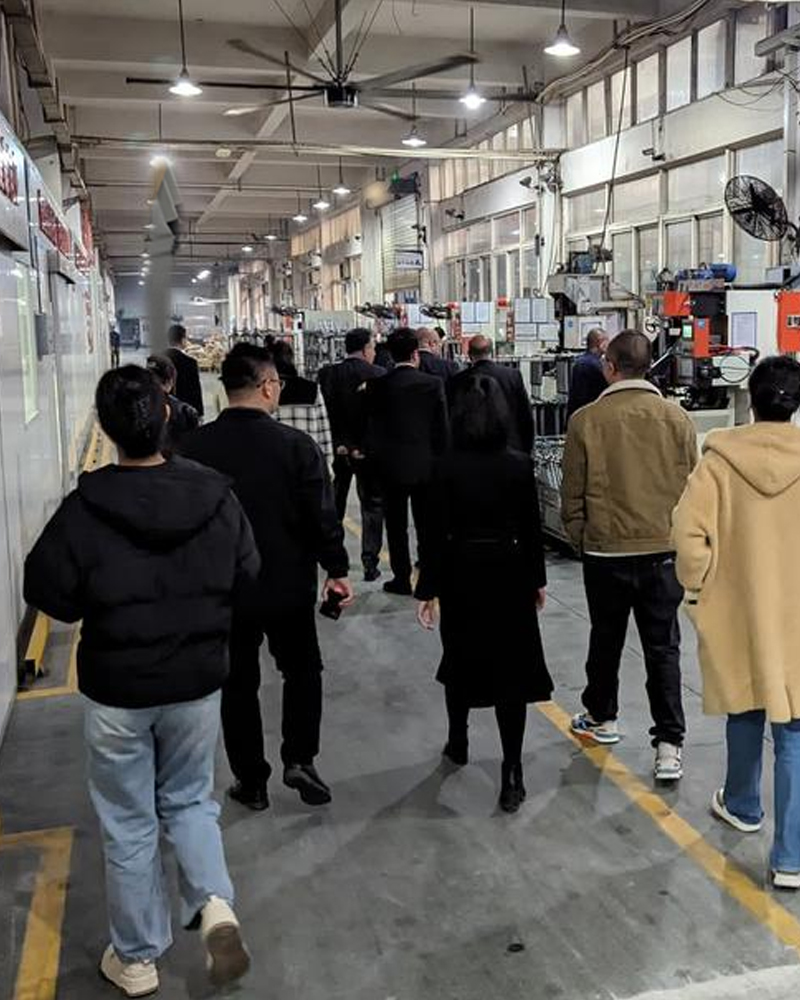Client facility tour inspecting vehicles Guangzhou