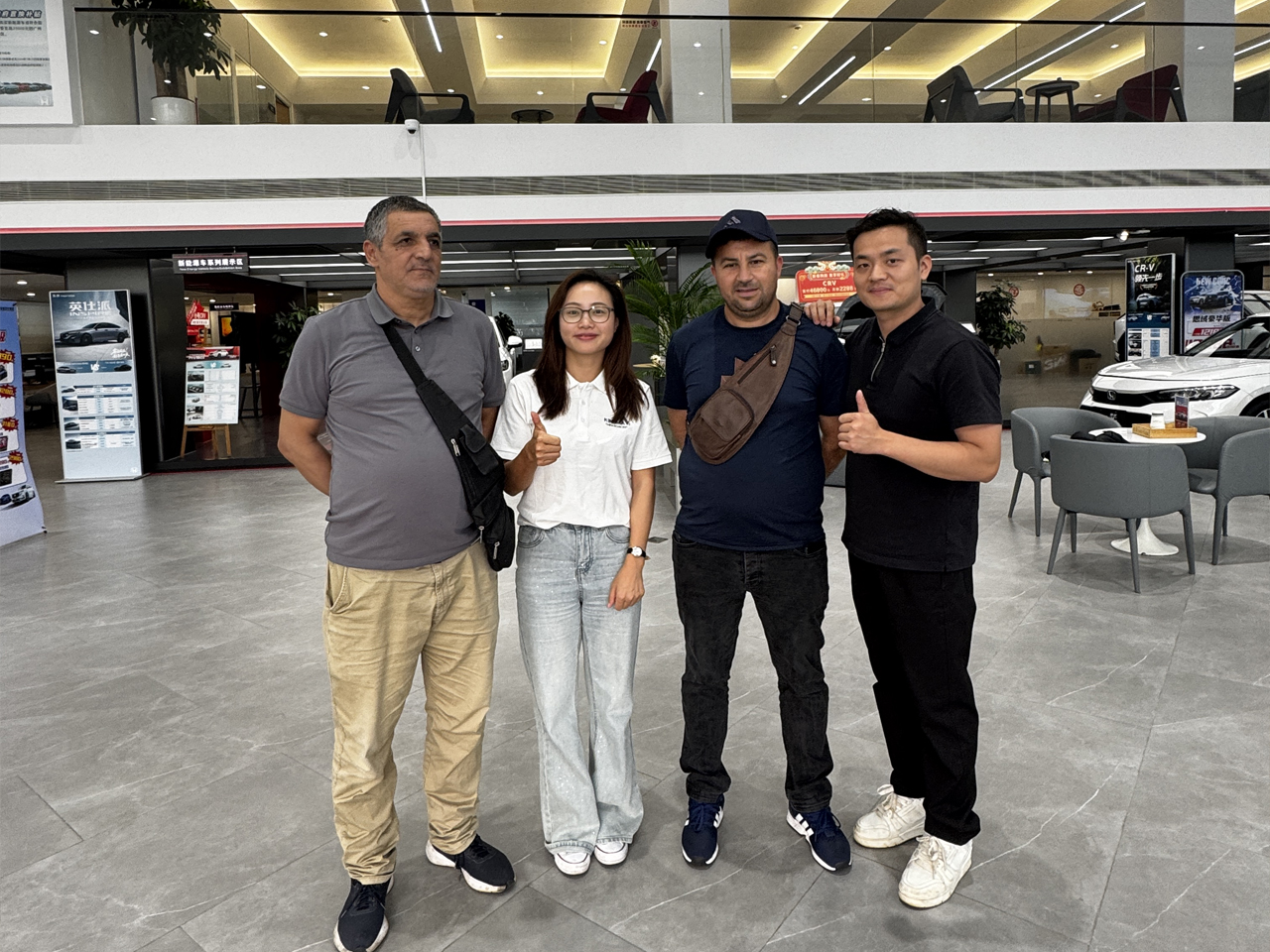Factory tour with international car importers viewing vehicles on-site